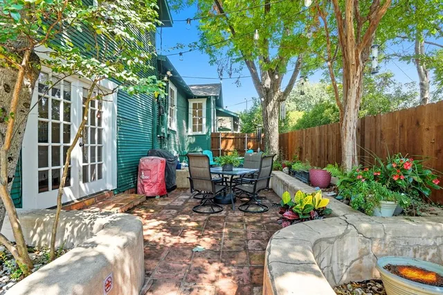 a backyard of a house with lots of green space