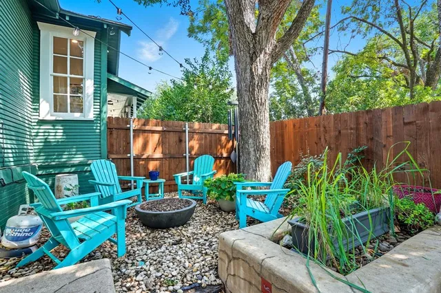 a backyard of a house with seating space