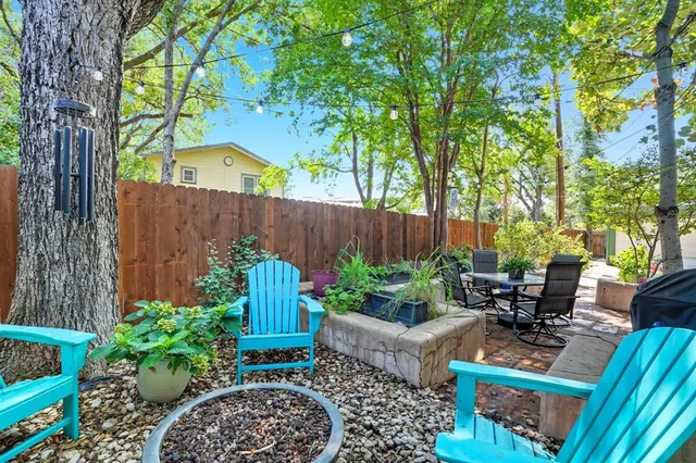front view of a house with a bench