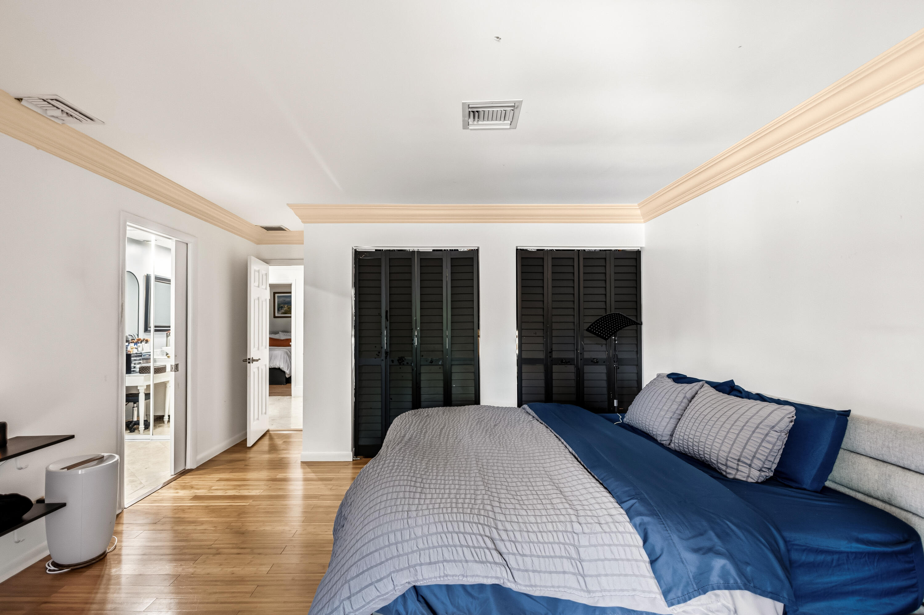 5223 Deerhurst Crescent Circle Boca Raton, FL 33486 - Photo 35 of 51 a bedroom with a bed and a large window