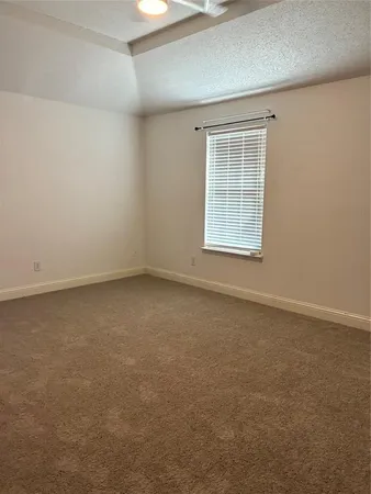 a bathroom with a sink double vanity granite and a mirror