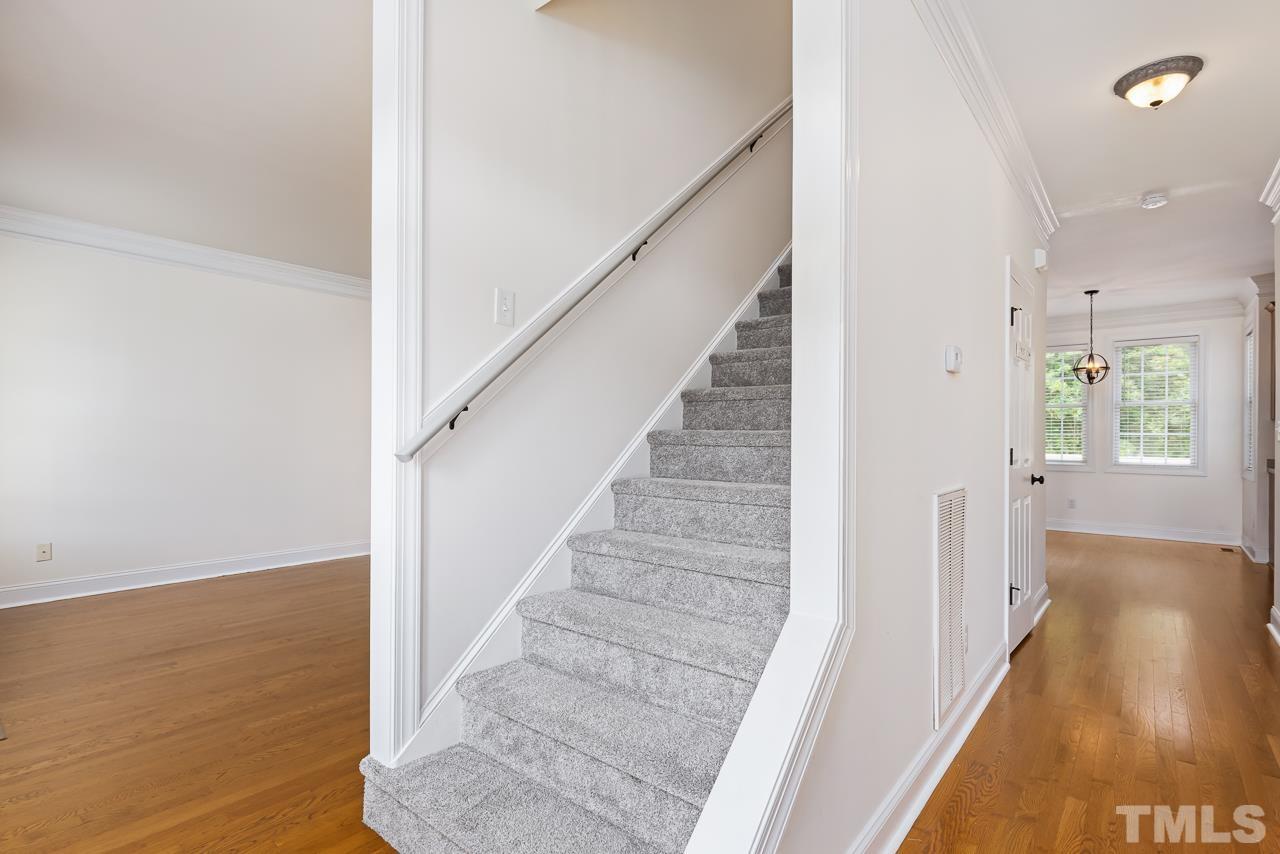 65 Bess Lane Angier, NC 27501 - Photo 11 of 38 a view of entryway and hall with wooden floor