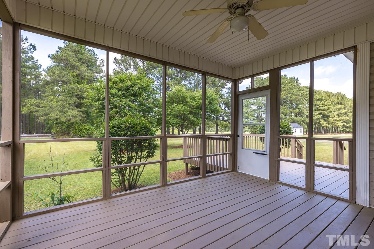65 Bess Lane Angier, NC 27501 - Photo 36 of 38 a view of a balcony with wooden floor