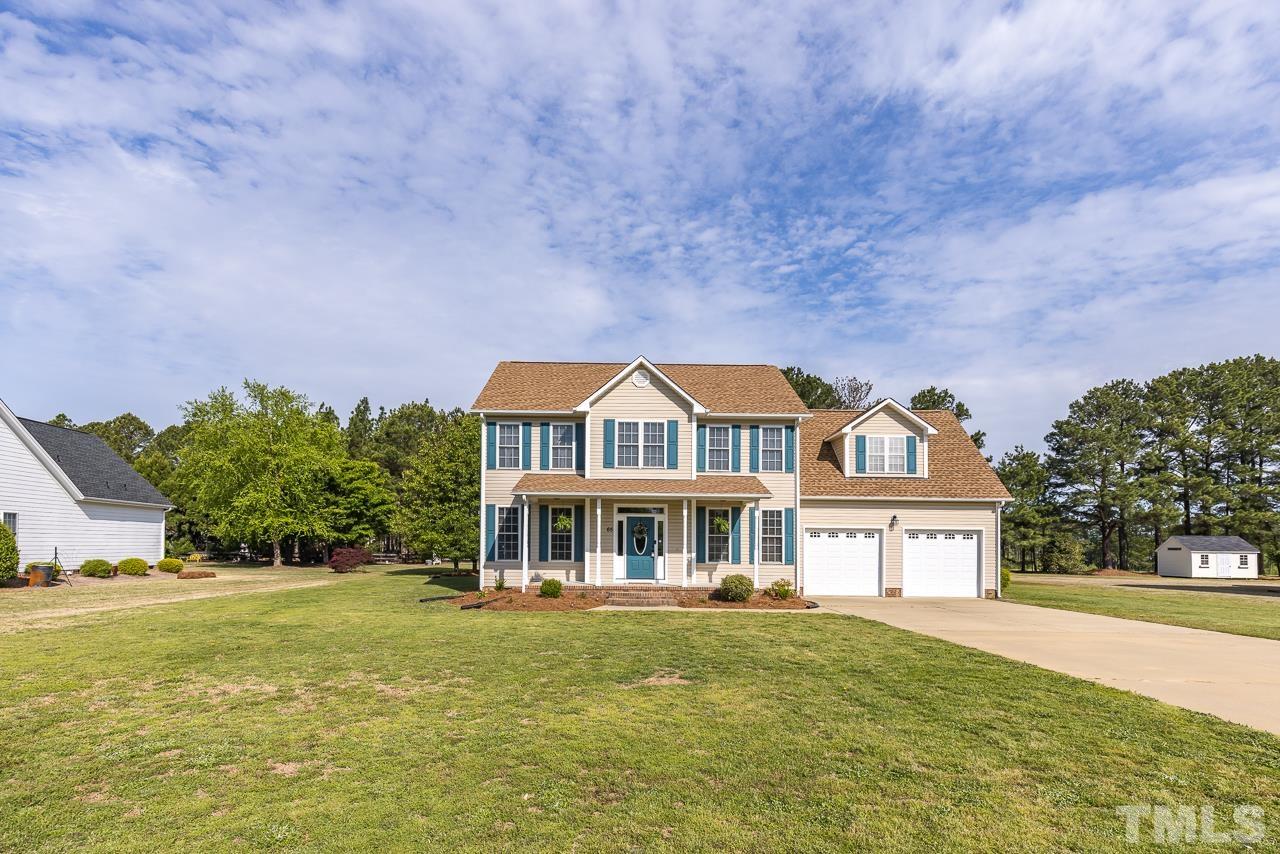 65 Bess Lane Angier, NC 27501 - Photo 7 of 38 a front view of a house with a yard