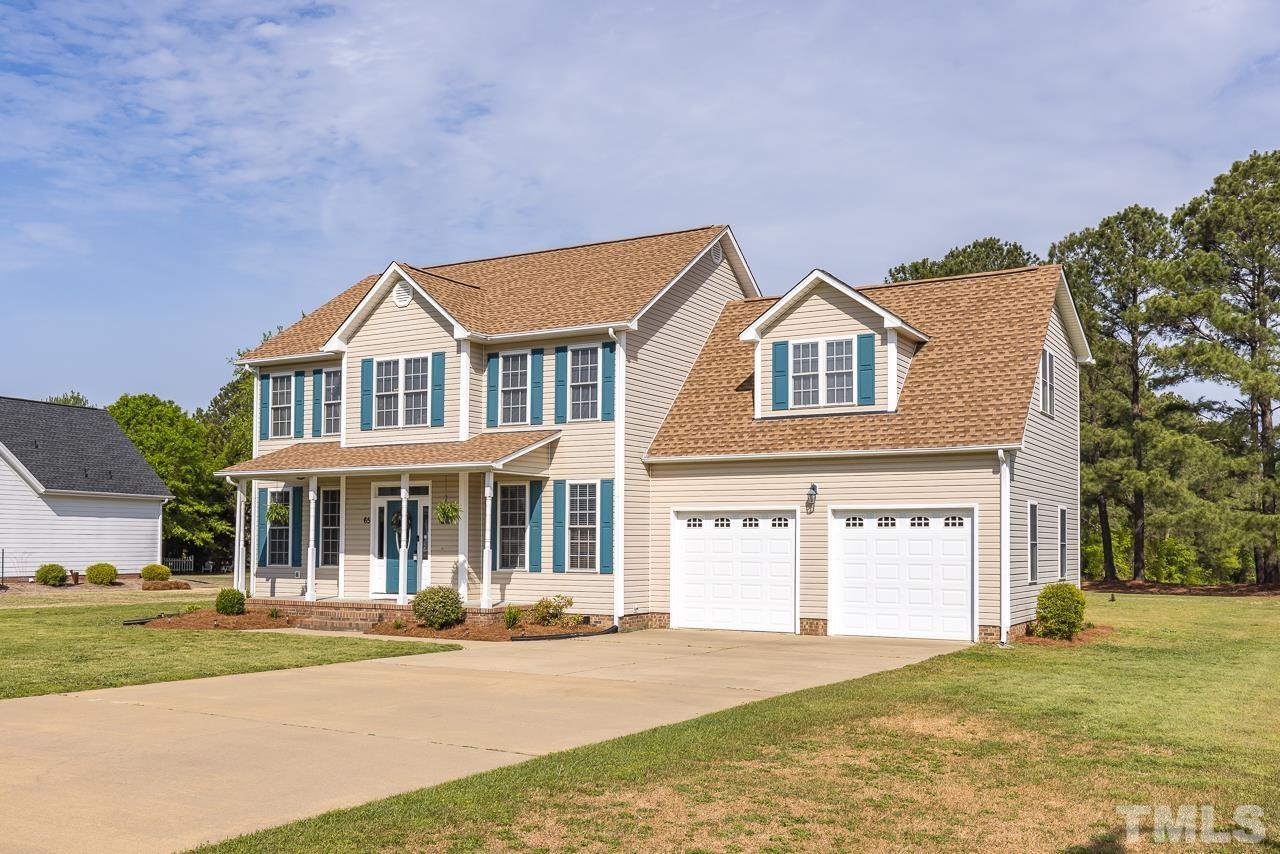 65 Bess Lane Angier, NC 27501 - Photo 8 of 38 front view of a house with a yard