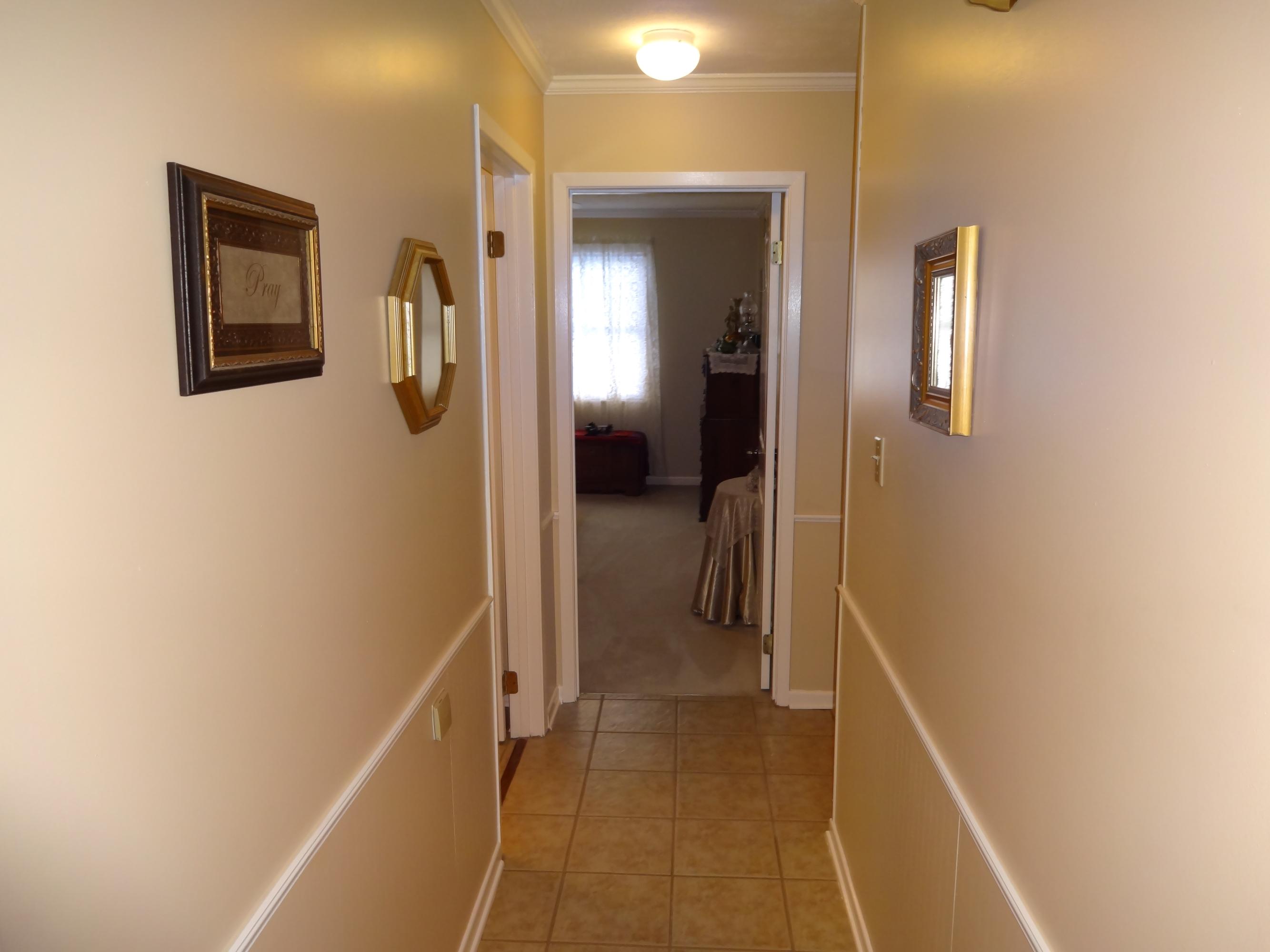 7712 Norwich Road, Unit 18 Powell, TN 37849 - Photo 11 of 34 Tiled hallway to bedrooms