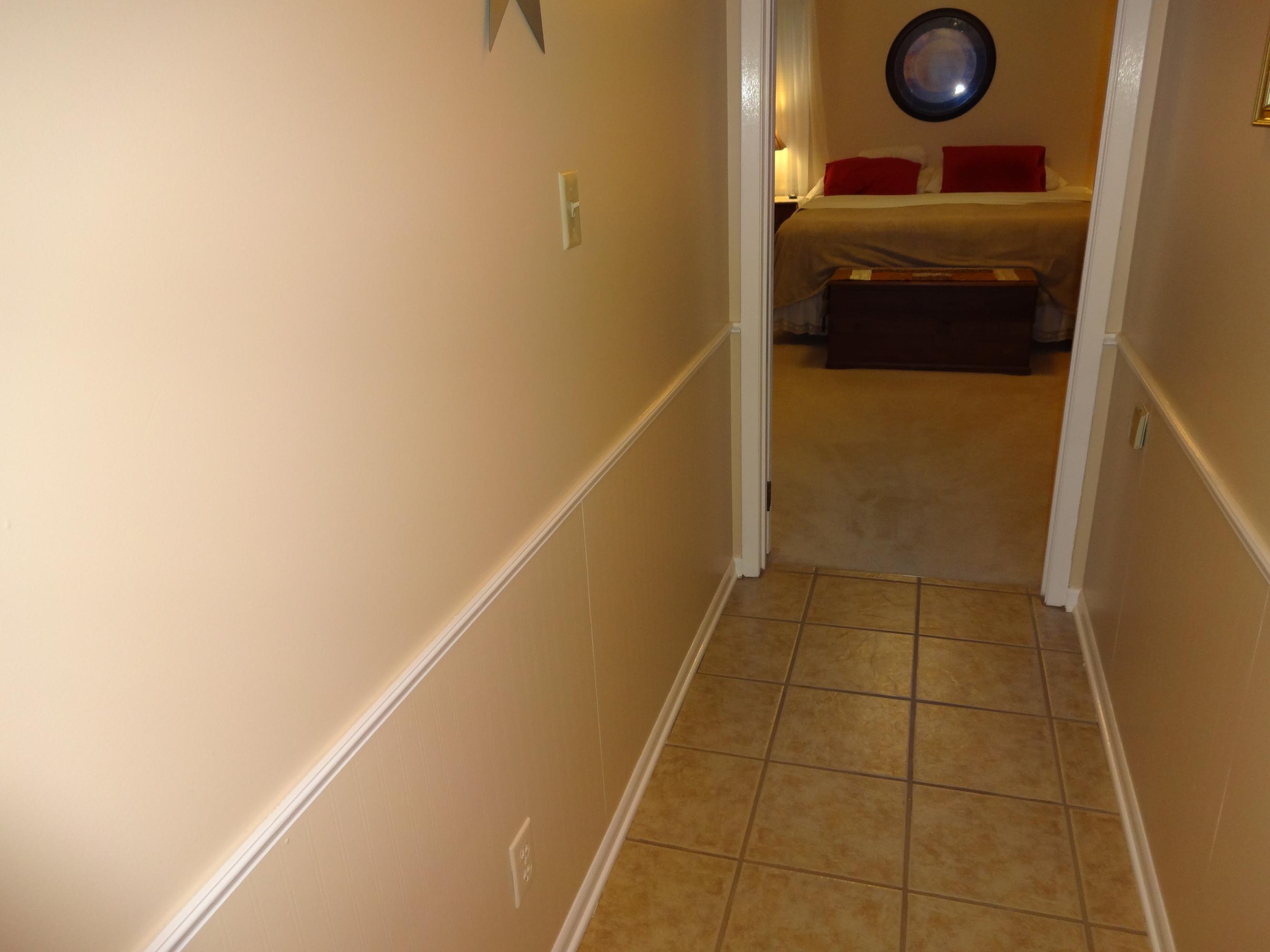 7712 Norwich Road, Unit 18 Powell, TN 37849 - Photo 30 of 34 Hallway to master bedroom w/chair rail