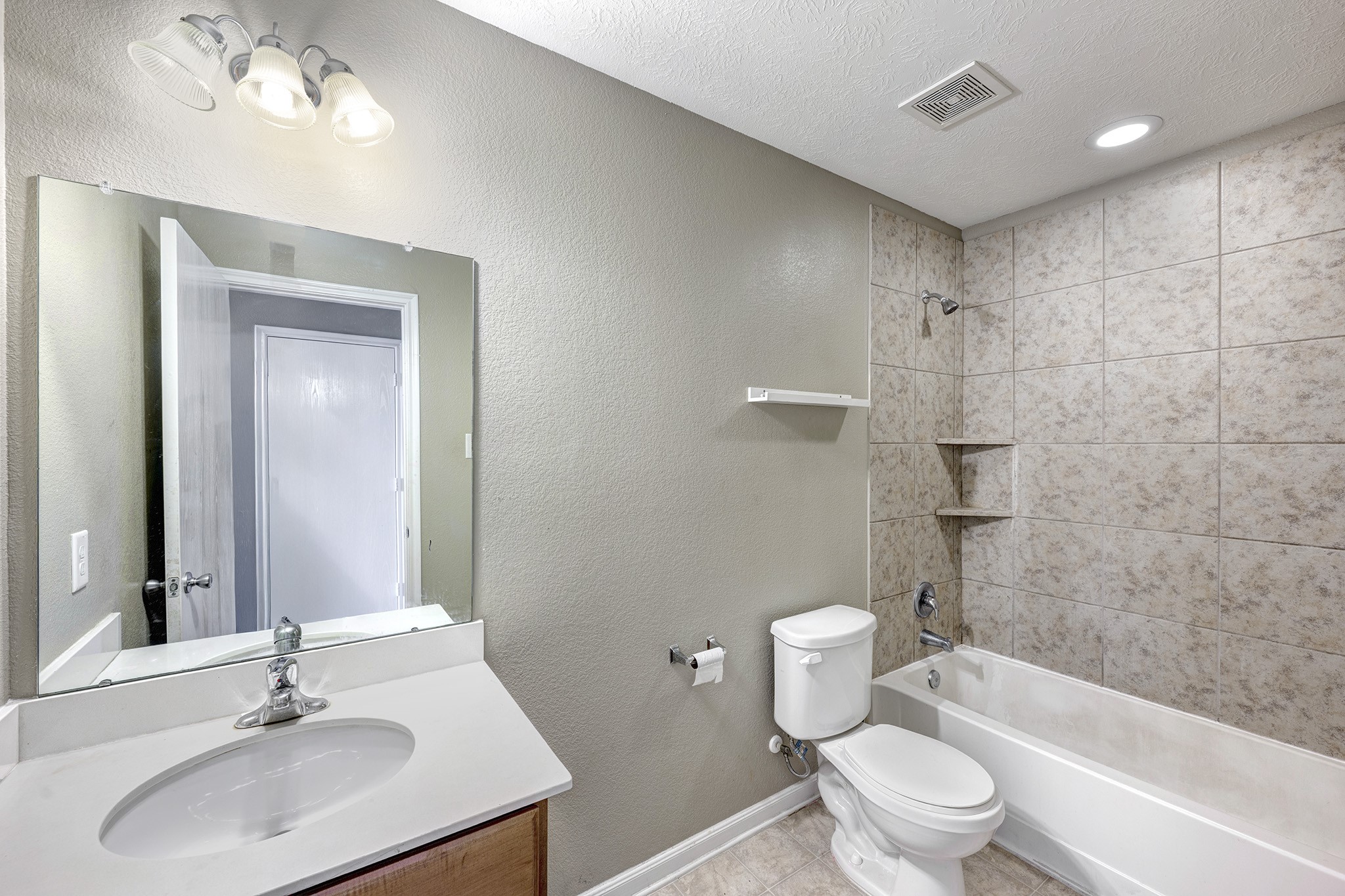 18953 Bobcat Path Houston, TX 77073 - Photo 13 of 21 a bathroom with a sink toilet and shower
