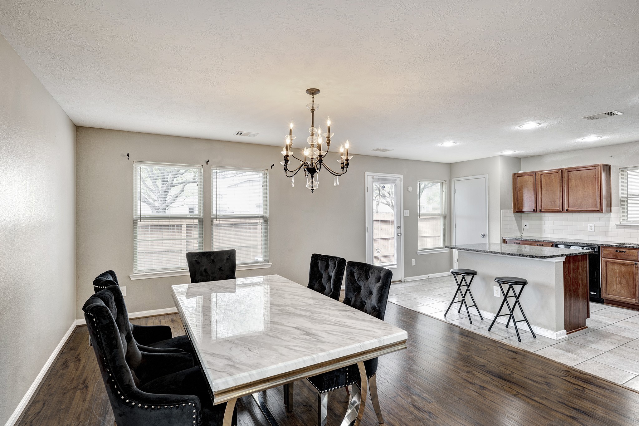 18953 Bobcat Path Houston, TX 77073 - Photo 5 of 21 a view of a dining room with furniture window and wooden floor