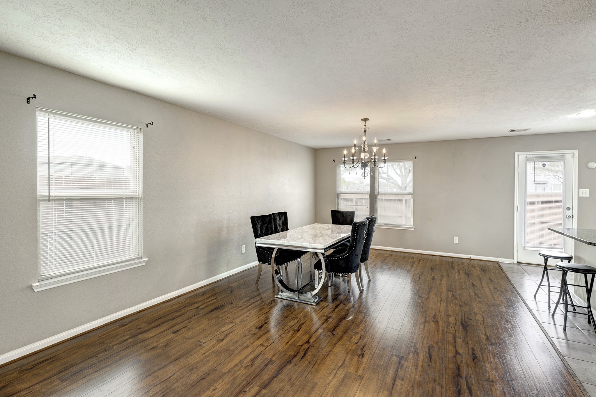 18953 Bobcat Path Houston, TX 77073 - Photo 6 of 21 Another view of dining area with gleaming hardwood floors
