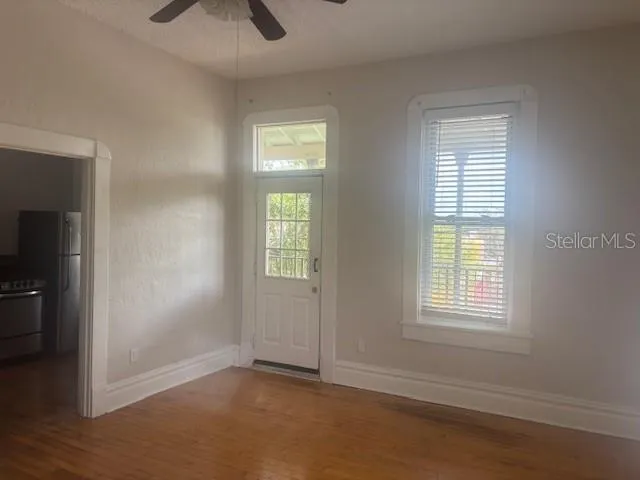 an empty room with windows