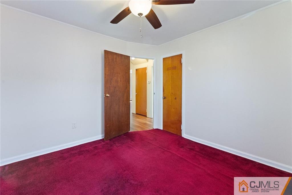 68 Middle Hill Road Colonia, NJ 07067 - Photo 15 of 33 an empty room with windows and fan