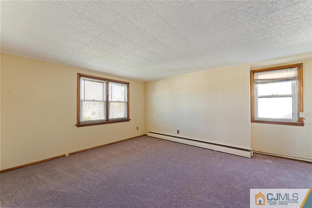 68 Middle Hill Road Colonia, NJ 07067 - Photo 16 of 33 an empty room with windows