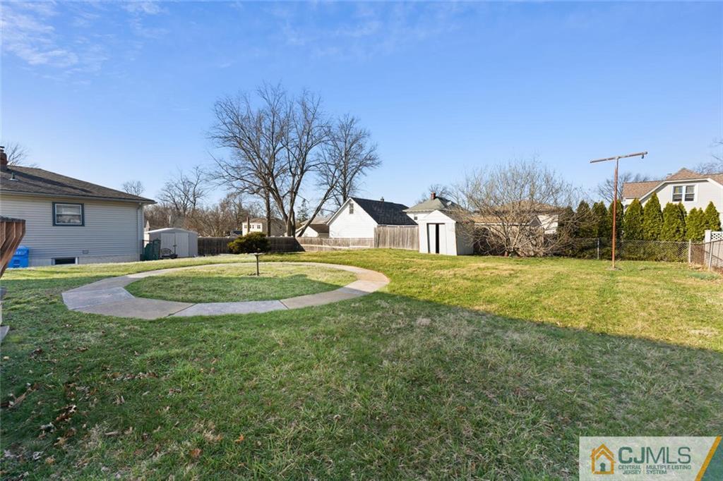 68 Middle Hill Road Colonia, NJ 07067 - Photo 27 of 33 a view of a house with a swimming pool