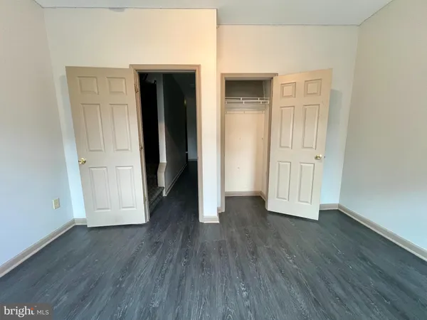 a bathroom with a sink toilet and mirror