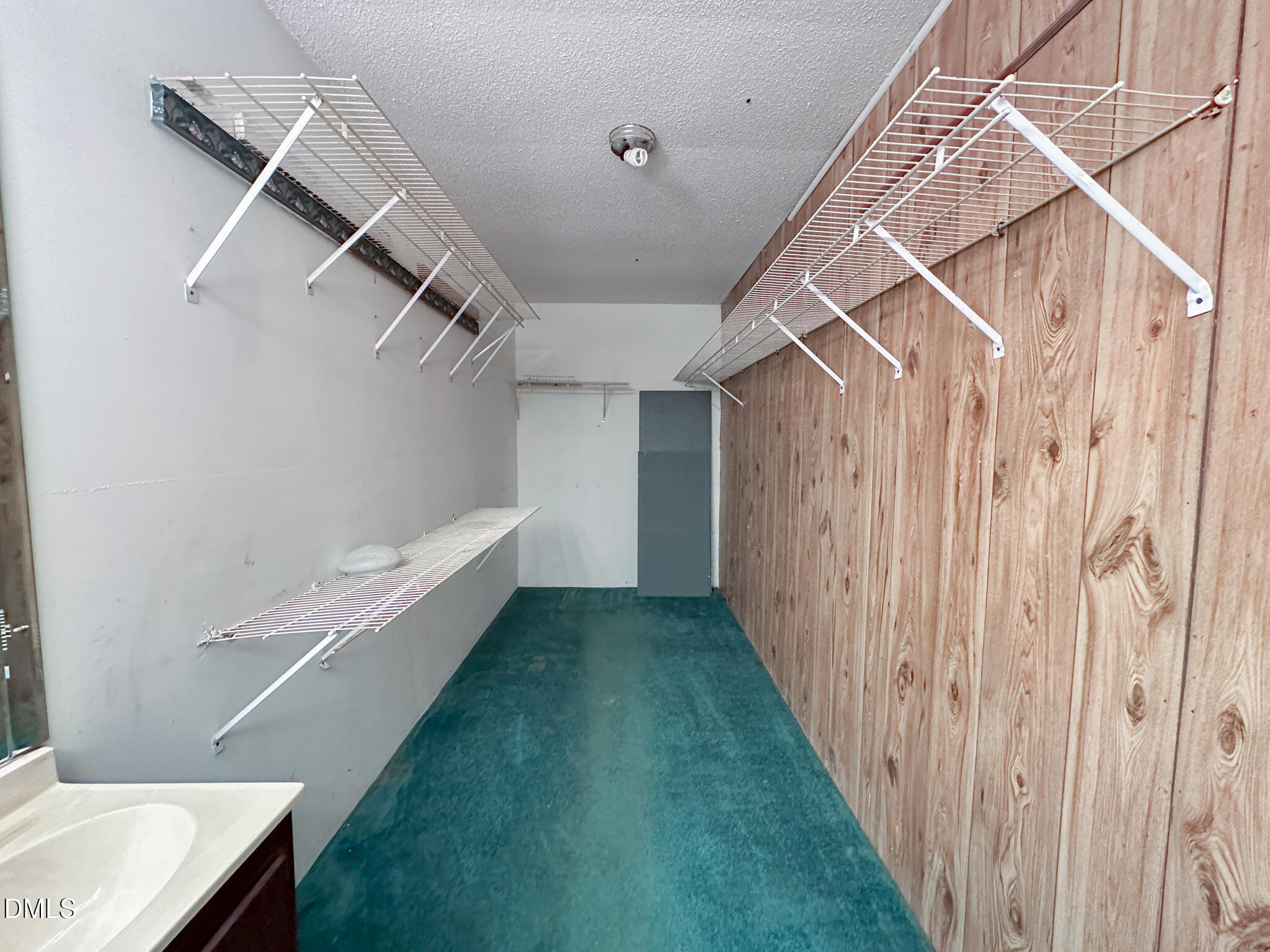 188 Jones Chapel Road Norlina, NC 27563 - Photo 49 of 71 a view of walk in closet with clothes and shoes