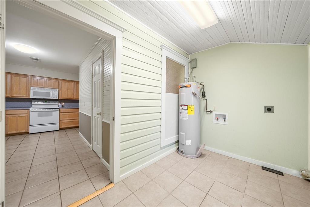 101 North 7th Street Krum, TX 76249 - Photo 21 of 26 Utilities featuring electric water heater