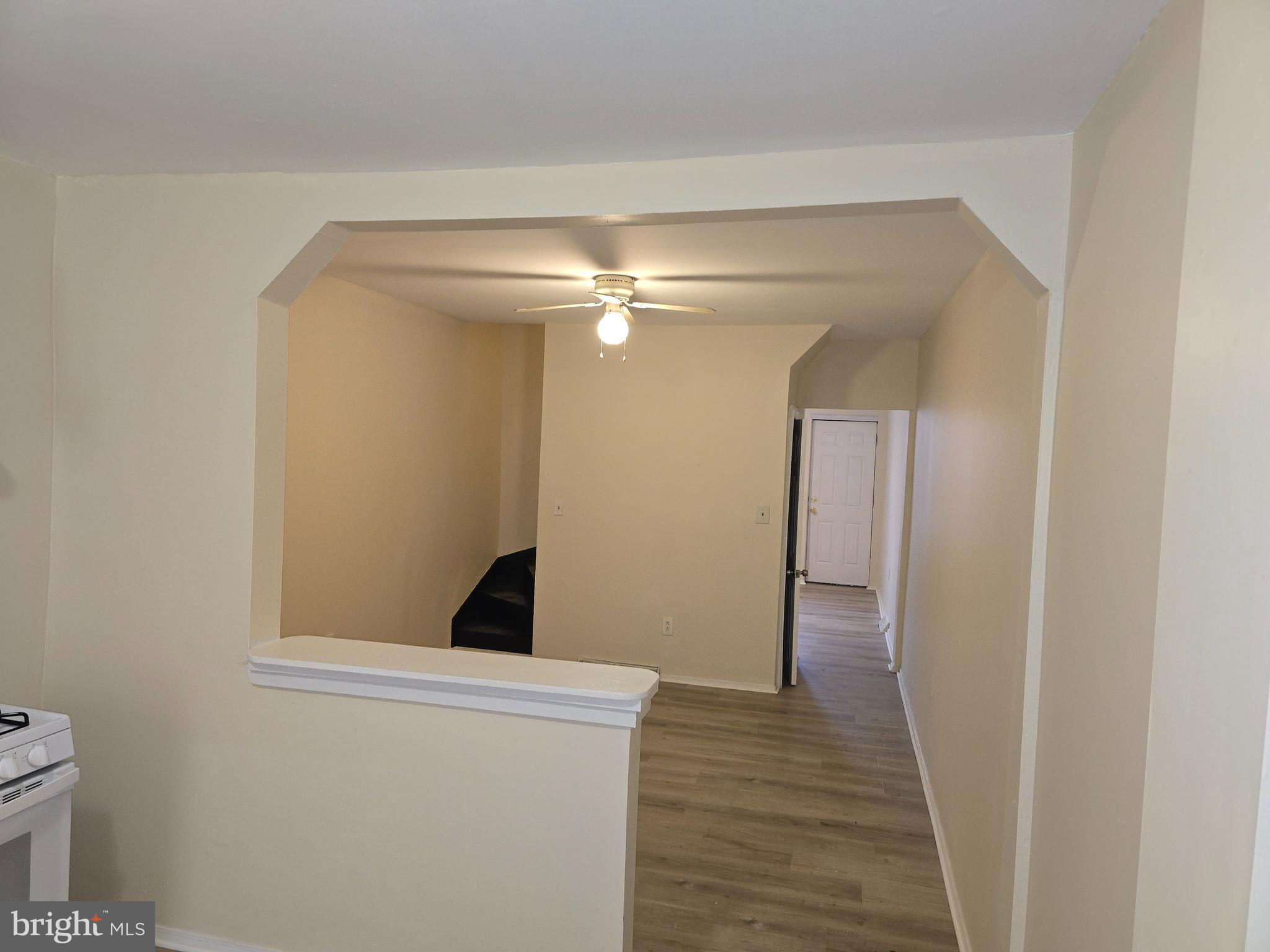 340 South Woodyear Street Baltimore, MD 21223 - Photo 8 of 19 a view of a hallway with wooden floor