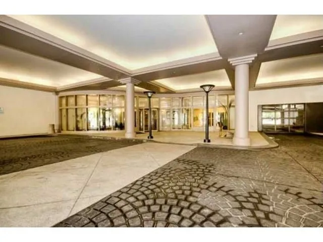 a bathroom with a tub and shower