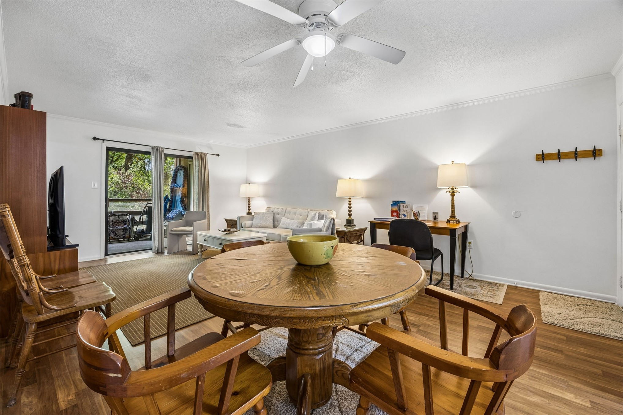 2328 Sadler Road, Unit 1C Fernandina Beach, FL 32034 - Photo 9 of 49 a dining room with furniture and a chandelier