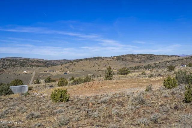 a view of lake with mountain