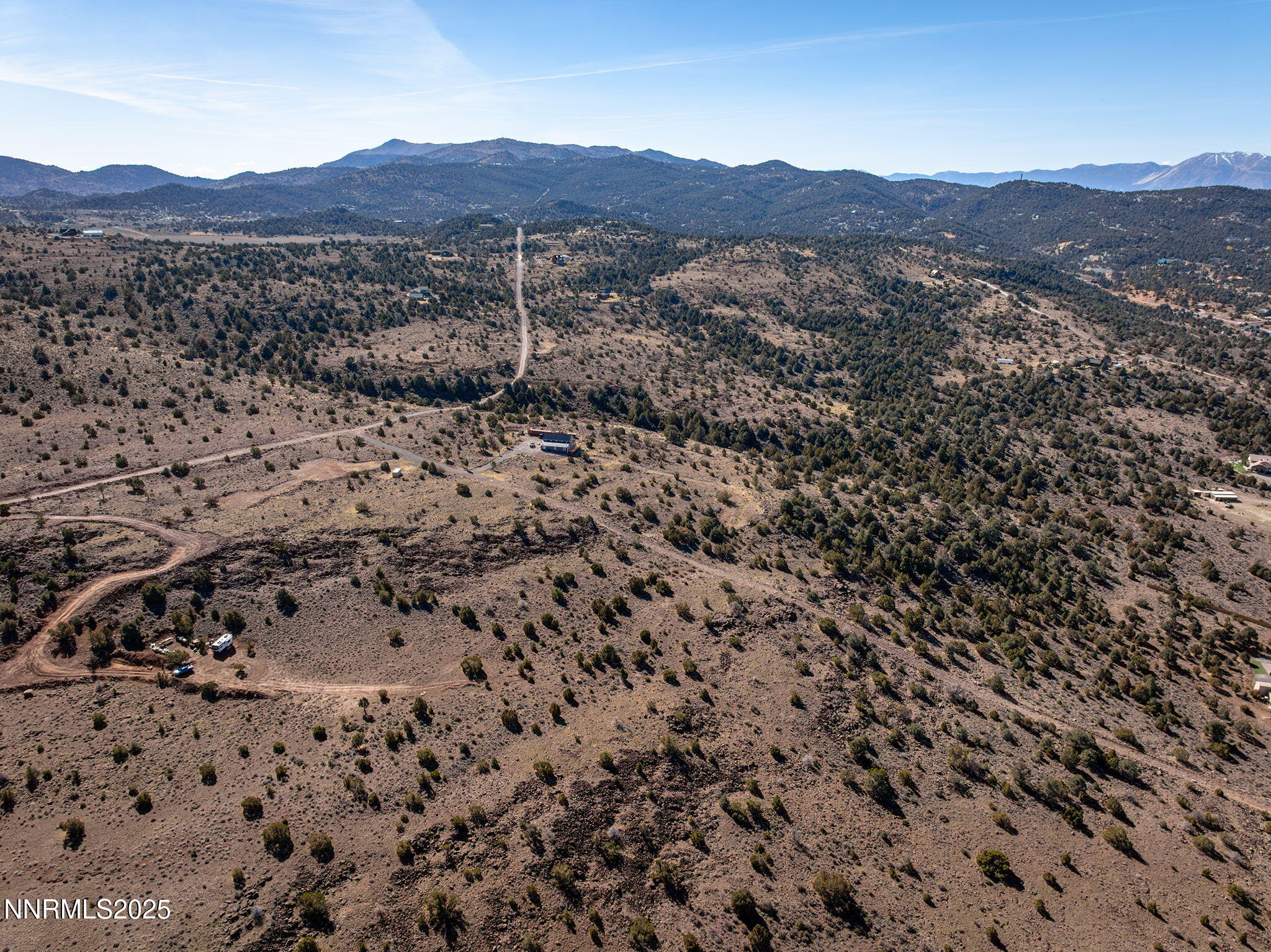 3790 Bullfrog Road Reno, NV 89521 - Photo 16 of 17 a view of a large mountain with a mountain in the background