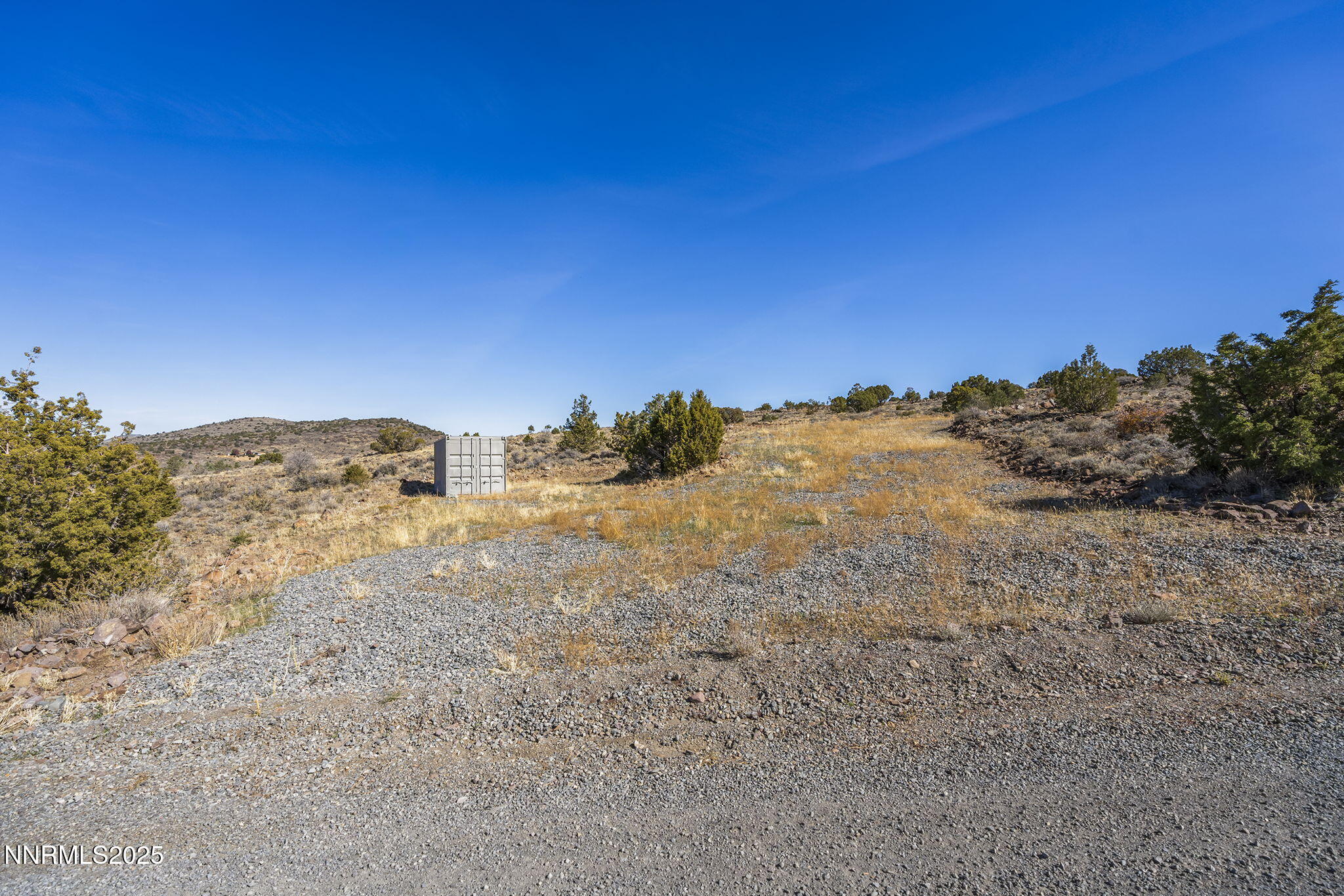 3790 Bullfrog Road Reno, NV 89521 - Photo 5 of 17 a view of mountain with sunset in background