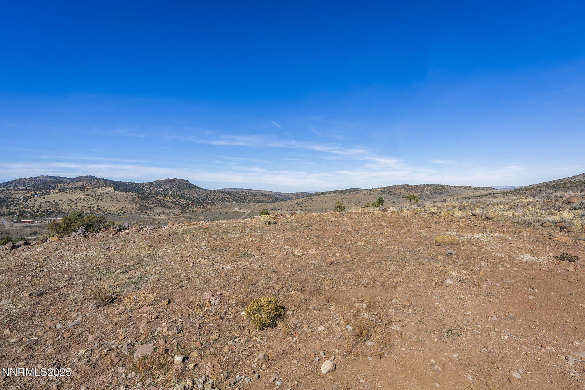3790 Bullfrog Road Reno, NV 89521 - Photo 8 of 17 a view of a large mountain with mountains in the background