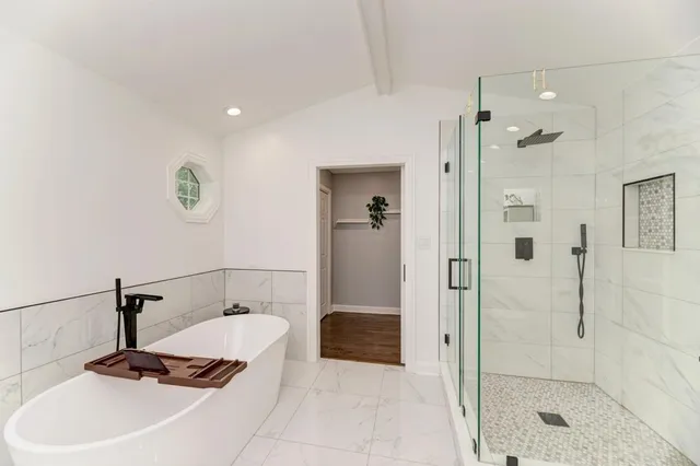 a bathroom with a sink and a shower