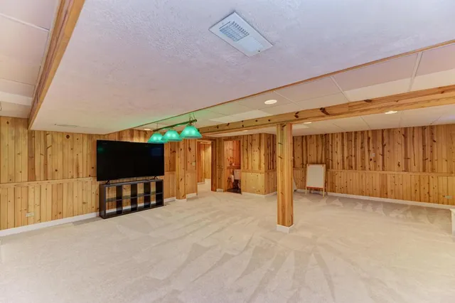 a view of a livingroom with a flat screen tv