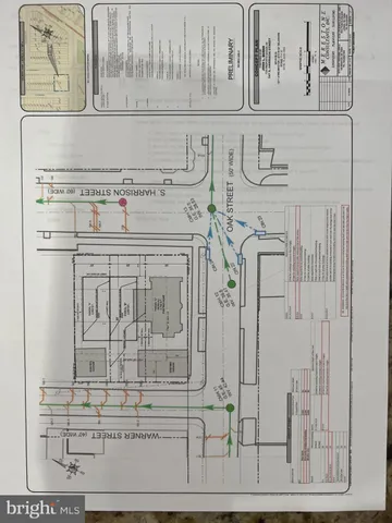 front view of a house with a tree