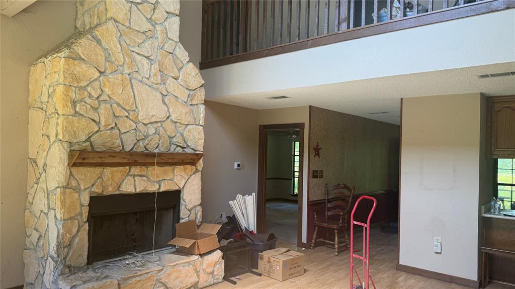 6582 Taylor Road Kaufman, TX 75142 - Photo 11 of 40 a view of a livingroom with furniture and a fireplace
