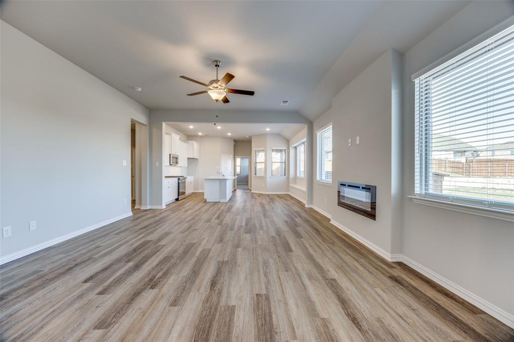 3728 Aqua Lane Sherman, TX 75090 - Photo 2 of 12 a view of empty room with wooden floor and fan