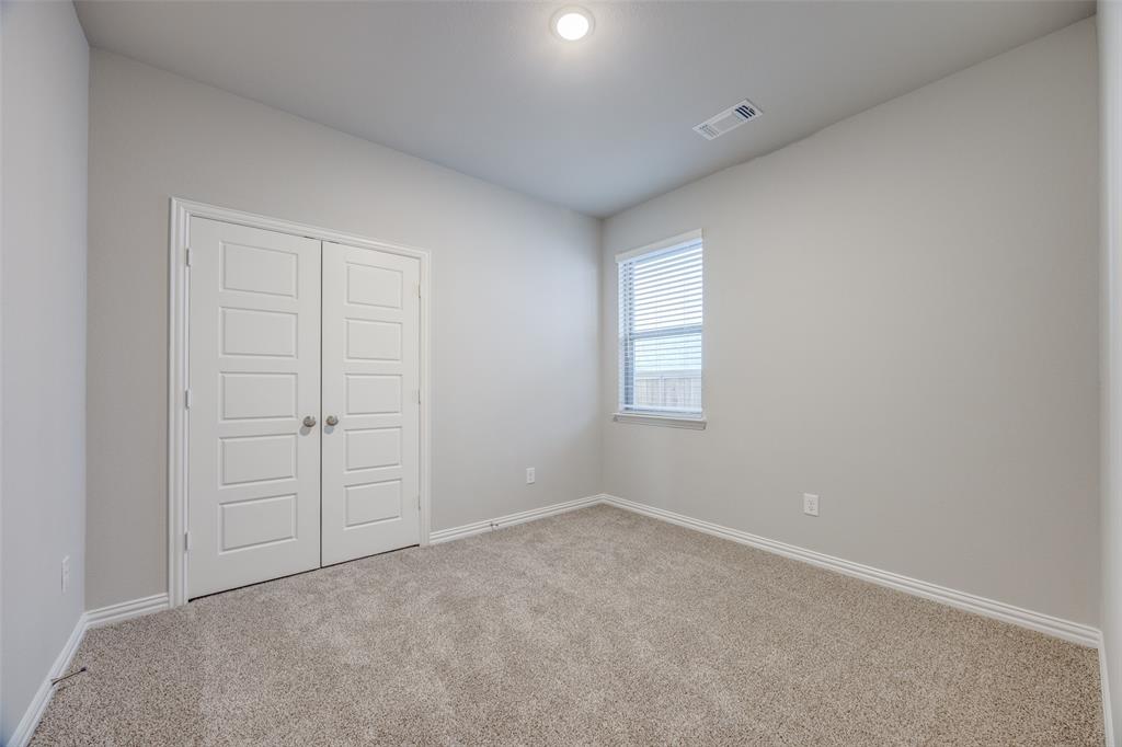 3728 Aqua Lane Sherman, TX 75090 - Photo 8 of 12 an empty room with windows