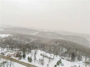 a view of a snow in the middle of a road