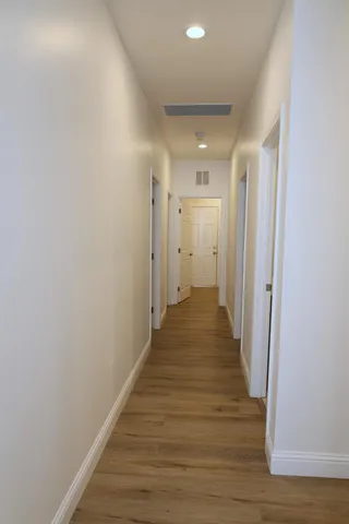 a view of a room with racks on the wall