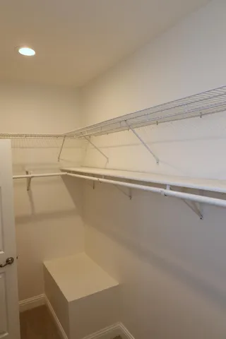 a view of a room with racks on the wall