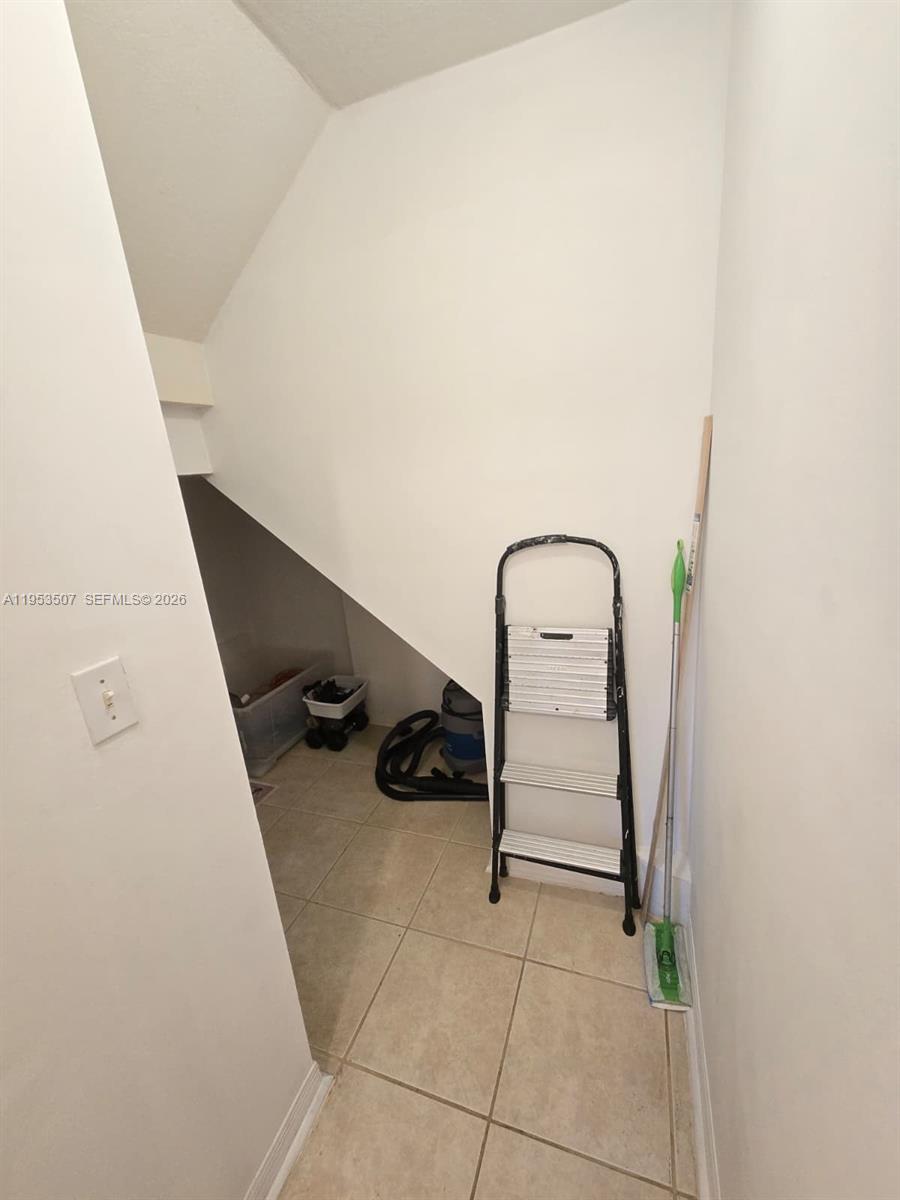 8394 Southwest 152nd Avenue, Unit 35 Miami, FL 33193 - Photo 20 of 24 a room with a washer and dryer