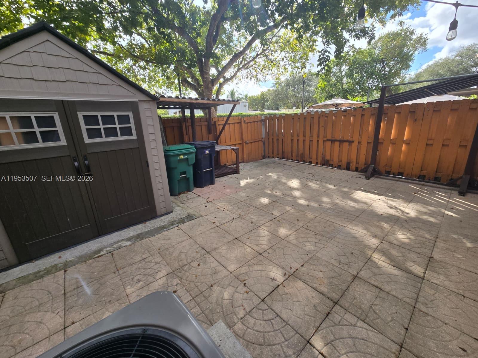 8394 Southwest 152nd Avenue, Unit 35 Miami, FL 33193 - Photo 23 of 24 a view of a backyard