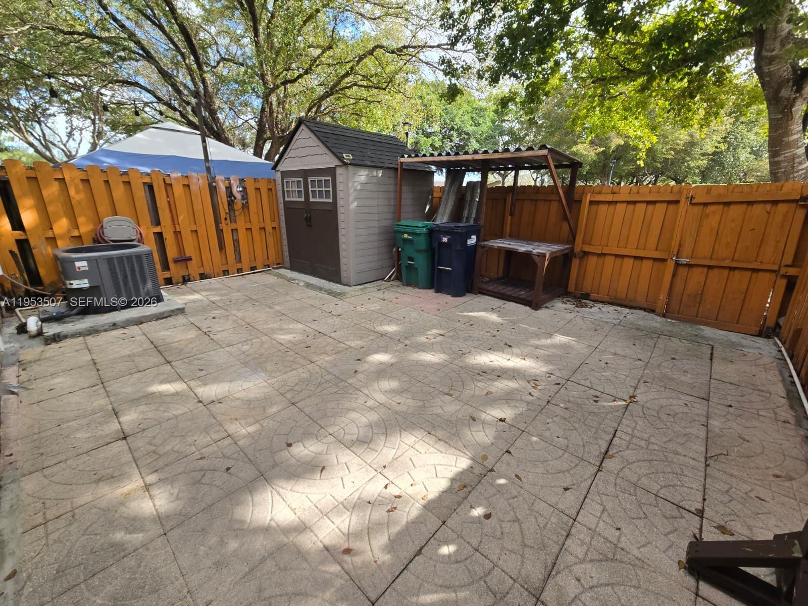 8394 Southwest 152nd Avenue, Unit 35 Miami, FL 33193 - Photo 24 of 24 a view of a backyard
