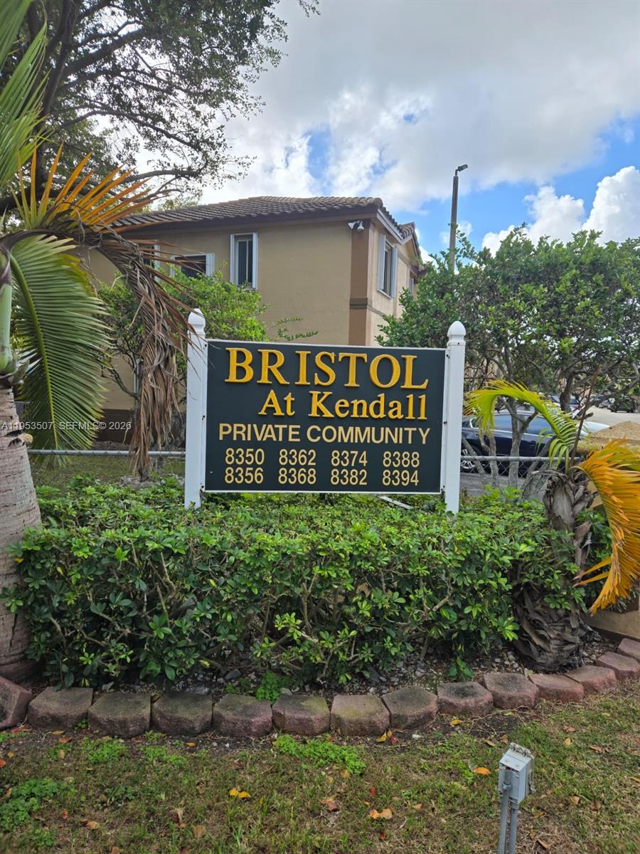 8394 Southwest 152nd Avenue, Unit 35 Miami, FL 33193 - Photo 3 of 24 a sign on the side of the building
