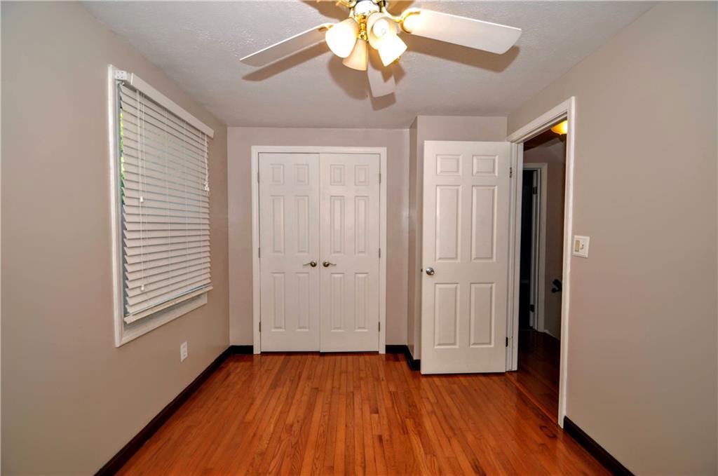 603 Meade Drive Coraopolis, PA 15108 - Photo 28 of 41 a view of an empty room with wooden floor and a window