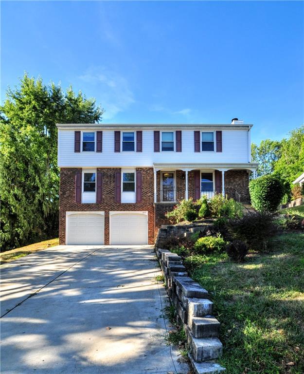 603 Meade Drive Coraopolis, PA 15108 - Photo 3 of 41 a front view of a house with a yard