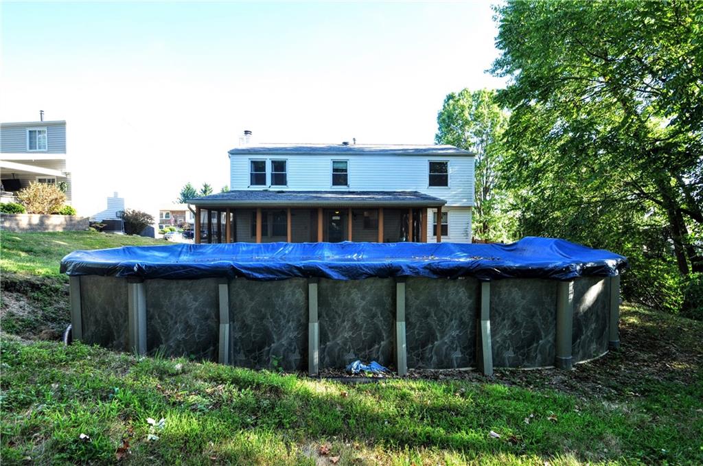 603 Meade Drive Coraopolis, PA 15108 - Photo 40 of 41 a view of a house with a yard plants and large tree