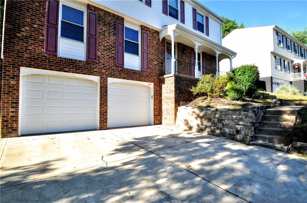 603 Meade Drive Coraopolis, PA 15108 - Photo 4 of 41 a front view of a building with parking space