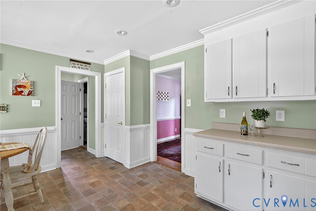 12831 Ashtree Road Midlothian, VA 23114 - Photo 12 of 45 a view of kitchen with granite countertop cabinets and chair