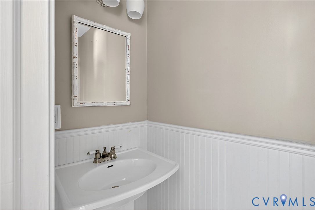12831 Ashtree Road Midlothian, VA 23114 - Photo 15 of 45 a white bath tub sitting next to a white sink