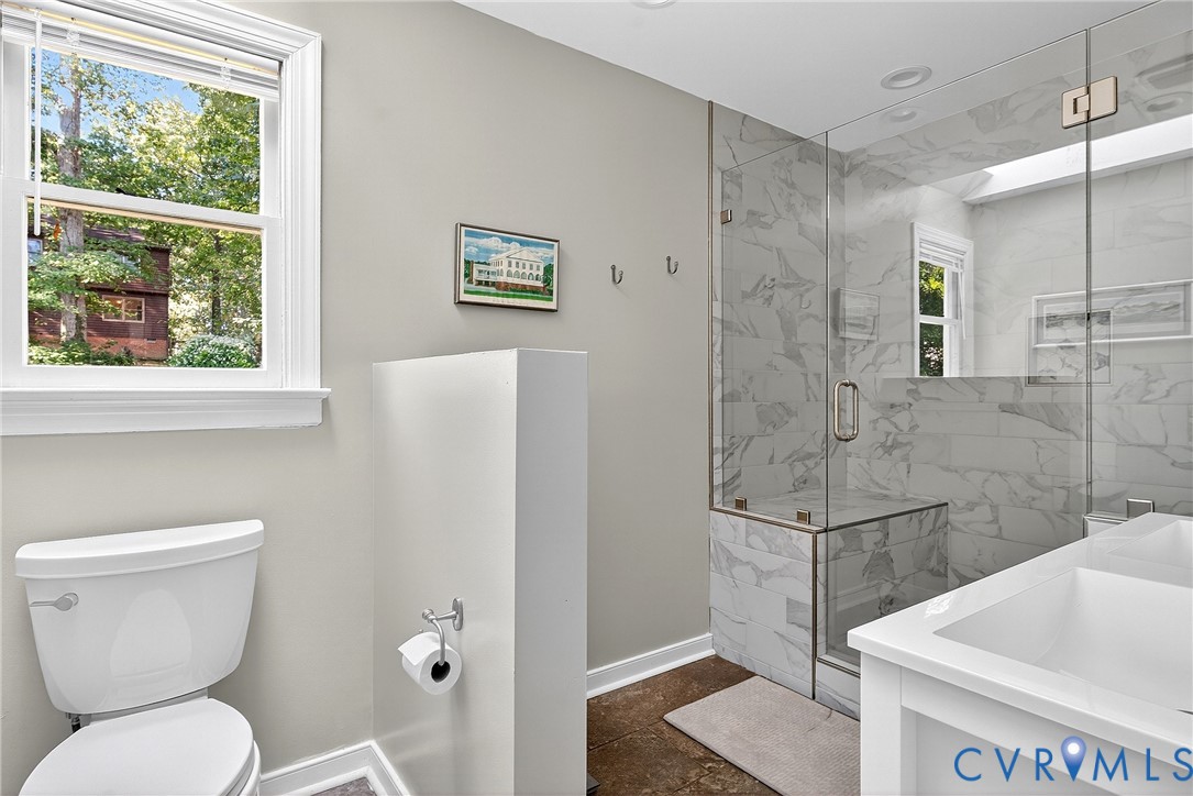 12831 Ashtree Road Midlothian, VA 23114 - Photo 27 of 45 a bathroom with a toilet and a shower