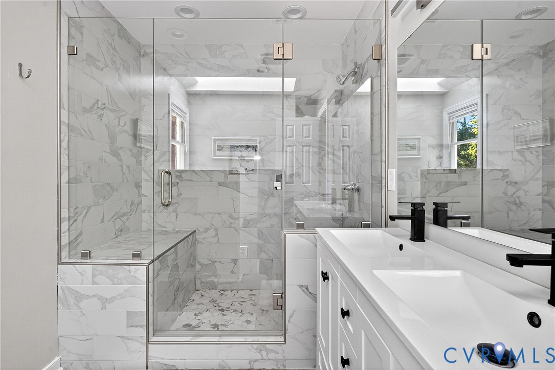 12831 Ashtree Road Midlothian, VA 23114 - Photo 28 of 45 a bathroom with a sink a shower and a mirror