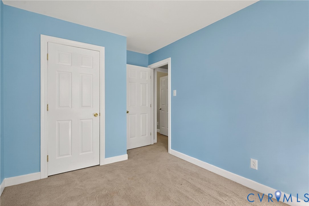 12831 Ashtree Road Midlothian, VA 23114 - Photo 35 of 45 a view of an empty room